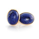 A PAIR OF LAPIS LAZULI EAR CLIPS Each collet set with an oval lapis lazuli cabochon weighing