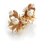 A PAIR OF PEARL EAR CLIPS Each of stylised spray design, each embellished with two pearls, graduated