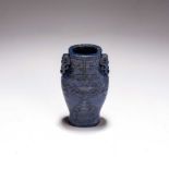 A CHINESE LAPIS LAZULI TWIN-HANDLE VASE, QING DYNASTY, 19TH CENTURY