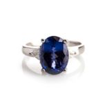 A TANZANITE AND DIAMOND RING