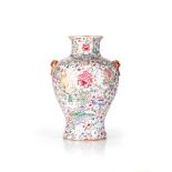 A CHINESE FAMILLE ROSE ‘MILLE FLEURS’ VASE, REPUBLIC PERIOD, 1912 – 1949