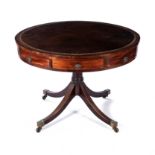 A REGENCY MAHOGANY DRUM TABLE