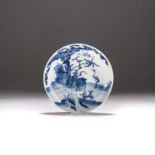 A CHINESE BLUE AND WHITE 'DEER AND CRANE' SAUCER DISH, QINQ DYNASTY, 18TH CENTURY