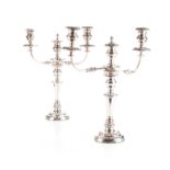 A PAIR OF ELECTROPLATE THREE-LIGHT CANDELABRA