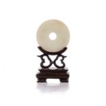 A CHINESE CELADON JADE 'BI' DISC, REPUBLIC PERIOD, 1912 - 1949