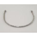 A DIAMOND TENNIS BRACELET