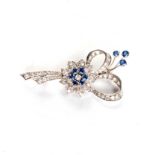 A DIAMOND AND SAPPHIRE BROOCH