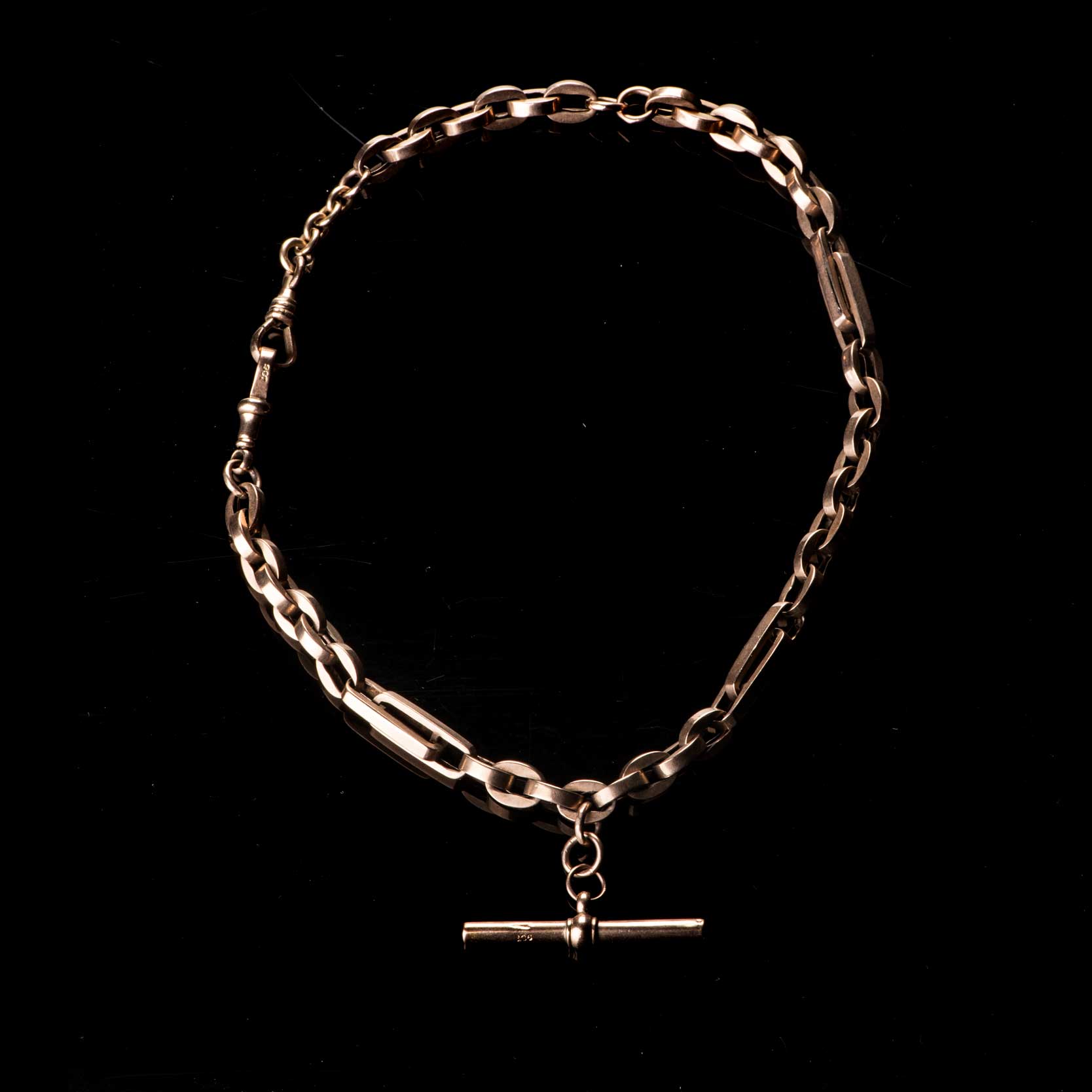 A GOLD FOB CHAIN