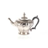 A VICTORIAN SILVER TEAPOT, FREDERICK BRADFORD MACREA FOR THE ARMY AND NAVY COOPERATIVE SOCIETY,