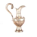 A SILVER JUG Topazio, the baluster body applied with moulded high relief with various scallops,