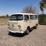 A 1969 VW KOMBI BAY WINDOW DELUXE This well-preserved example is fitted with the original "deluxe"