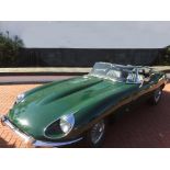 A 1969 JAGUAR E-TYPE 4.2 SERIES 2 CONVERTIBLE Colour green with black leather interior in full