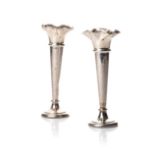 A PAIR OF SILVER SPECIMEN VASES Folded rim, tapering bodies, mounted on a circular double foot,