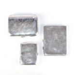 A COLLECTION OF THREE SILVER CIGARETTE CASES Various makers and dates, 393g all in (3)