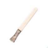 A SILVER CAKE LIFTER WITH BONE INSERT Ornate engraved handle with scallops and pressed section, 30cm