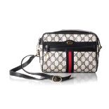 A GUCCI CROSSBODY HANDBAG Black leather adjustable shoulder strap, canvas and leather with