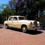 A 1957 MERCEDES-BENZ 220S PONTON SEDAN Finished in mayflower yellow with red leather upholstery