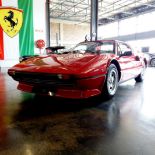 A 1981 FERRARI 308 GTSI Finished in "rosso corsa" with tan leather upholstery and satin black