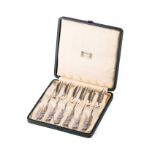 A SET OF SIX SILVER FORKS, LIBERTY AND CO, 1907 With leaf detail, hallmarked, accompanied by an