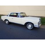 A 1967 MERCEDES-BENZ 250SEB W111 COUPE Finished in sea foam white with red leather upholstery and