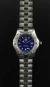 LADIES' TAG HEUER WRISTWATCH, circular blue dial with luminous hour markers and hands, date