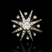 Antique silver paste starburst brooch, silver stamped 935 to the reverse, set with numerous paste
