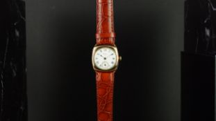 GENTLEMEN'S WALTHAM USA CUSHION CASED GOLD TONE, CIRCA 1931, MANUALLY WOUND WRISTWATCH, circular