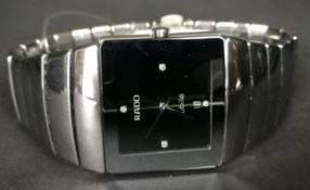 MID SIZE RADO JUBILE WRISTWATCH, square black dial with diamond set hour markers, silver hands and a