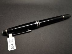 Mont Blanc black lacquer and white metal ballpoint pen, needs refill.