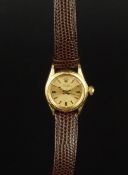 LADIES' 18CT GOLD ROLEX OYSTER PERPETUAL, 24mm circular gold case, Rolex crown, round gold dial,