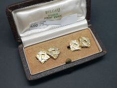 A pair of 18ct bi-colour gold cufflinks, bearing the makers mark for Georges L'Enfant, a