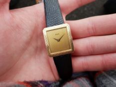 MID SIZE PIAGET 18K GOLD WRISTWATCH, rectangular gold dial with gold dauphine hands, thick