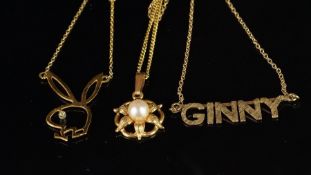 Selection of three pendants, comprising a personalised pendant with the name Ginny on an