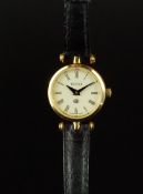 LADIES' GUCCI WRISTWATCH, circular dial, black Roman numerals, gold plated case with red and green