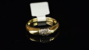 Diamond ring, set with seven single cut diamonds, in a heavy yellow metal band, with Italian control