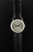 MID SIZE PIAGET 18K WHITE GOLD WRISTWATCH, circular silver dial with black roman numerals,