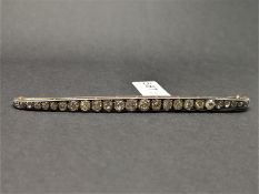 Diamond long bar brooch, mounted in yellow and white metal stamped with the French eagle's head, set