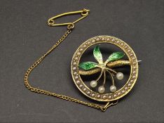 Victorian pearl and enamel brooch, central floral motif set with four pearls and enamel detail,