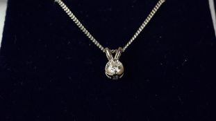 Single stone diamond pendant, round brilliant cut diamond weighing an estimated 0.20ct, mounted in