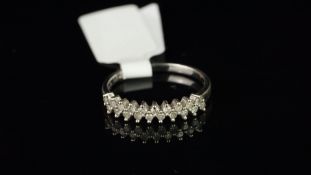 Diamond half eternity ring, two rows of round cut diamonds, weighing an estimated total of 0.20ct,