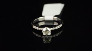 Diamond ring, round brilliant cut diamond weighing an estimated 0.45ct, with diamond set