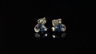 A pair of sapphire and diamond ear studs in 9ct white gold, gross weight approximately 1.0 gram.