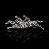 Horse and rider diamond set brooch, mounted in unmarked yellow and white metal, set with round