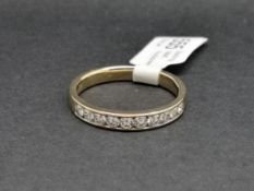Diamond half eternity ring, round brilliant cut diamonds, channel set in 9ct yellow gold, together
