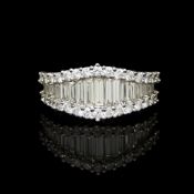 Diamond dress ring mounted in white metal stamped 18K 750, claw set with thirty round brilliant