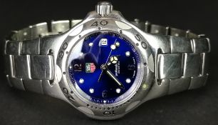 LADIES' TAG HEUER KIRIUM WRISTWATCH, circular blue dial with silver hour marker and a date aperture,