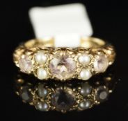 Amethyst and seed pearl half hoop ring, three round cut amethyst, each separated by two seed pearls,