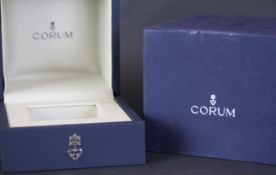 CORUM BLUE WATCH BOX WITH OUTER BLUE BOX, MISSING INTERIOR.