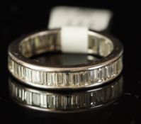 Diamond full eternity ring, baguette cut diamonds weighing an estimated total of 2.60ct, set in