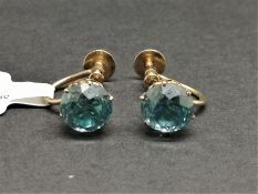 Pair of zircon earrings, round cut blue zircons, mounted in 9ct yellow gold, with screw back